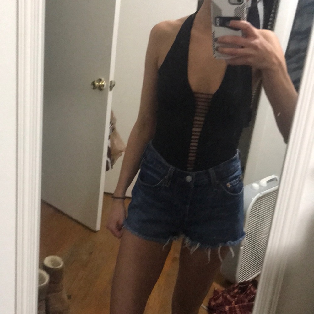 Unique scrappy black body suit